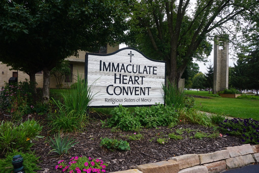 convent-front-sign-with-clock-tower